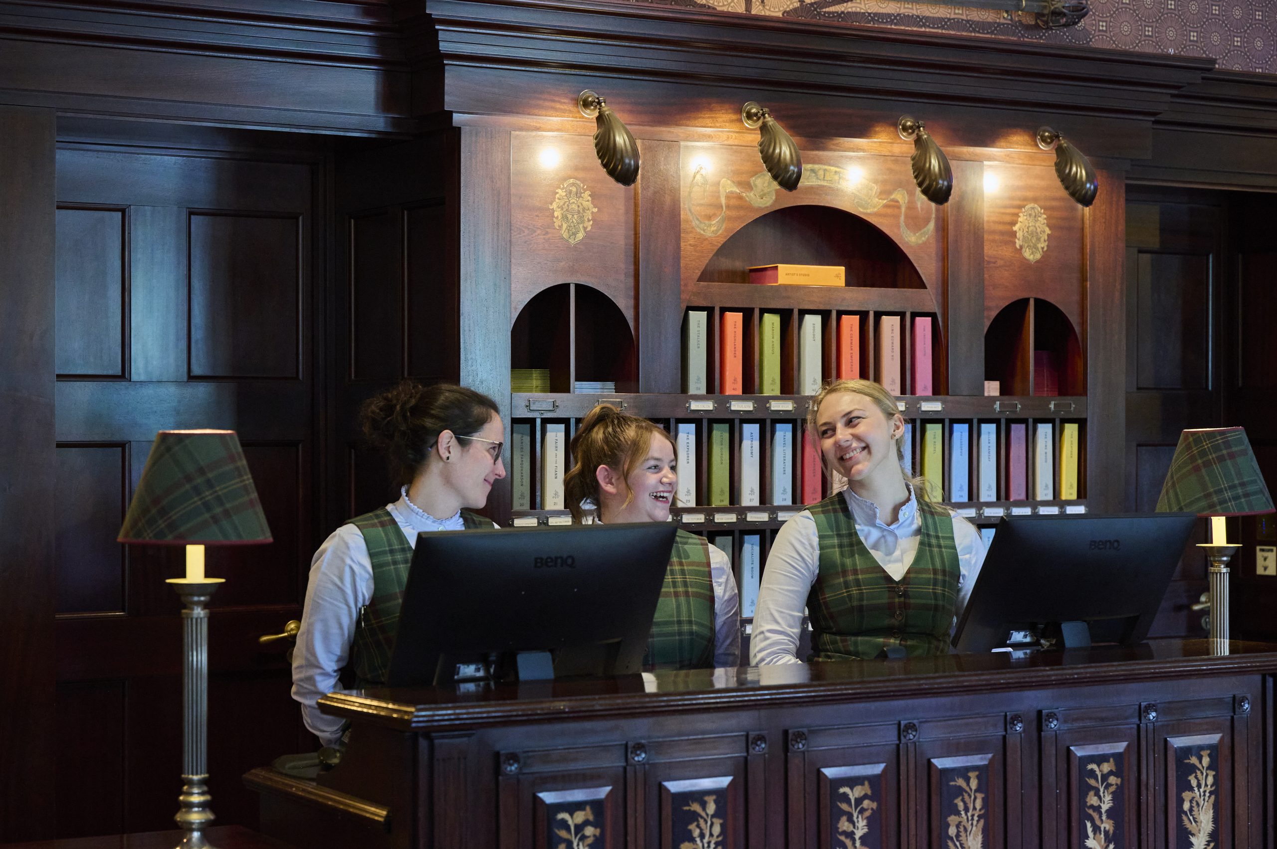 Front desk team at the Fife Arms hotel in Braemar