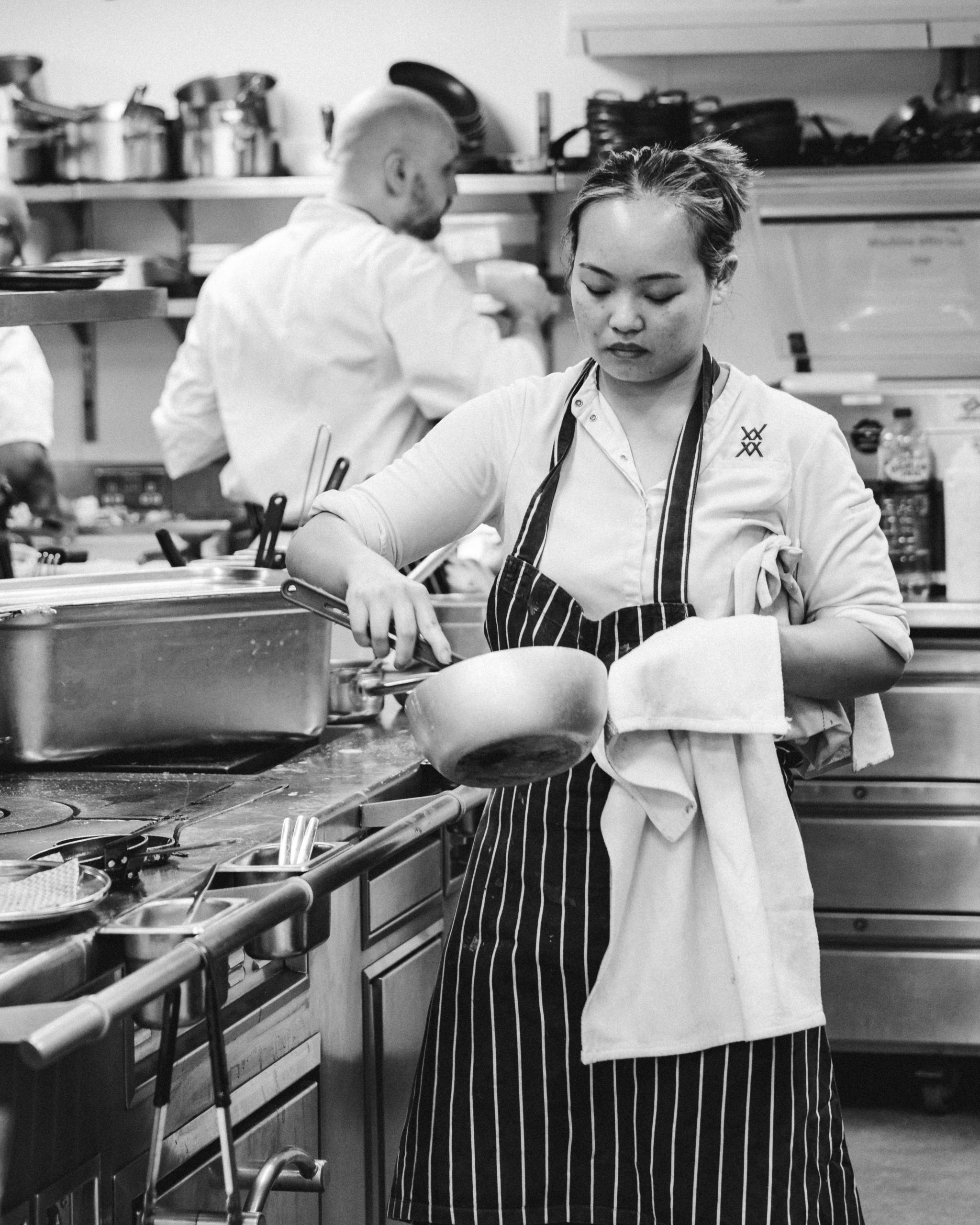 Female chef in the kitchen at Mount St. Restaurant